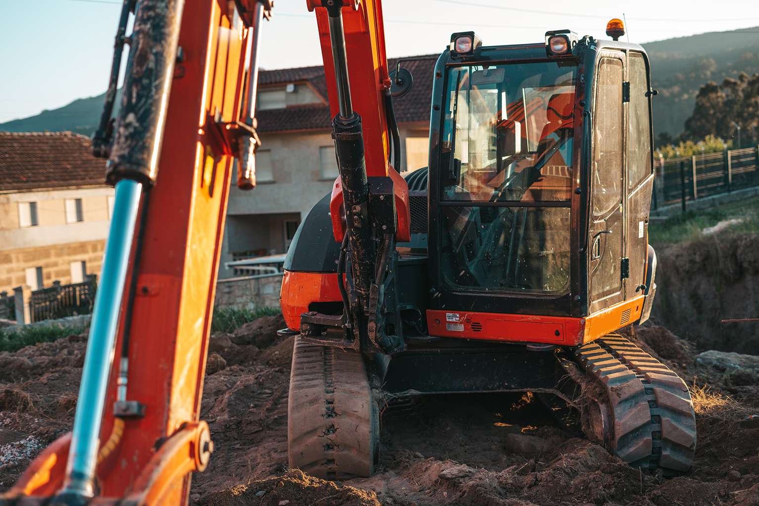 Baumaschine bei der Baugrundvorbereitung